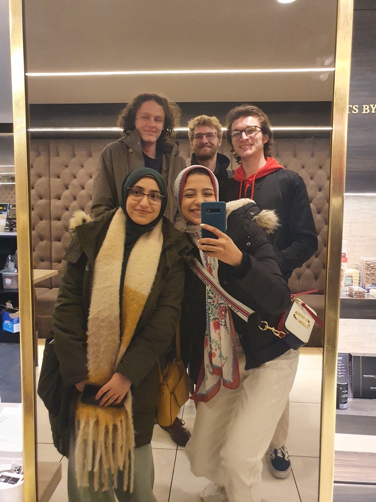 A photo of 5 developers: Johnny, Nick, Sam, Nada and Nayira